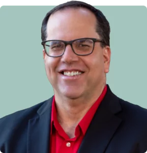 Headshot of Alex Caputo-Pearl