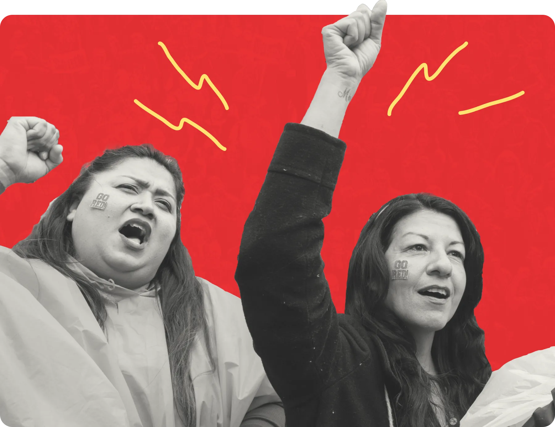 Two females standing side by side, each person holding a fist raised in the air